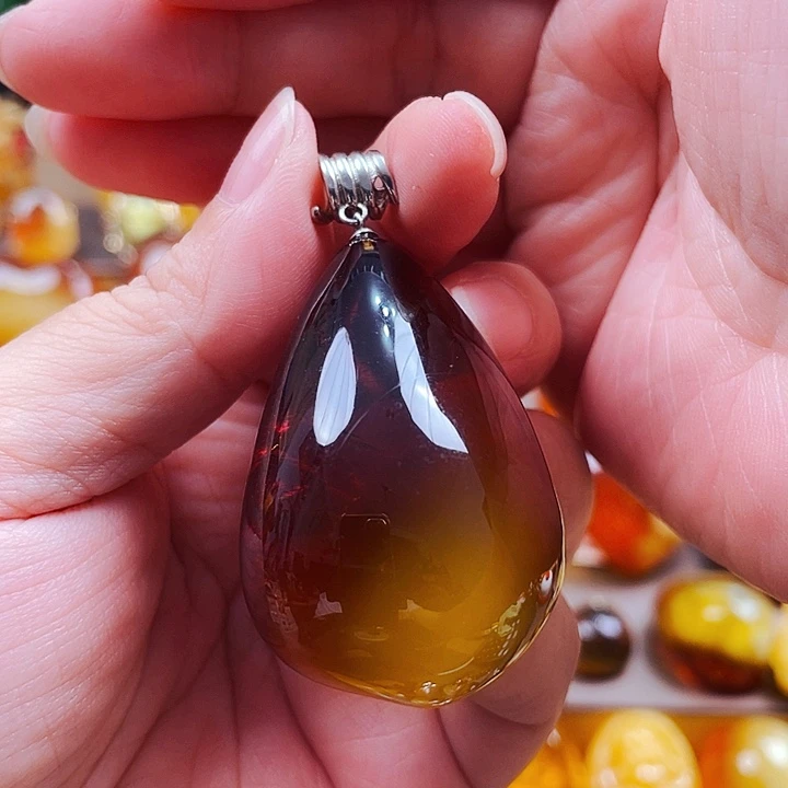 燕***言银S925镶嵌琥珀耳饰吊坠