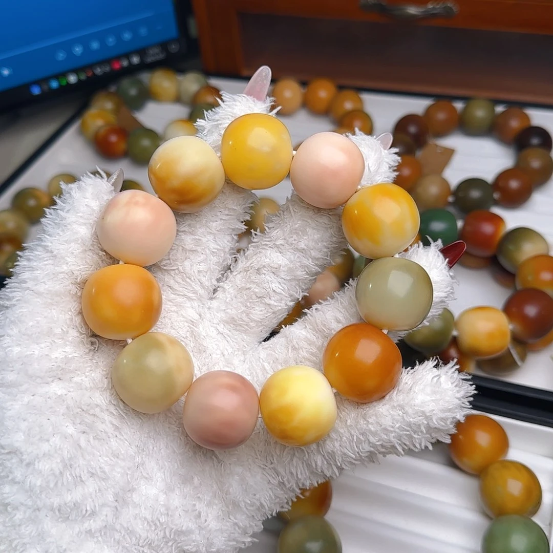 菩提根/象牙果手串七*昂卡24干磨苹果中瑕2不退