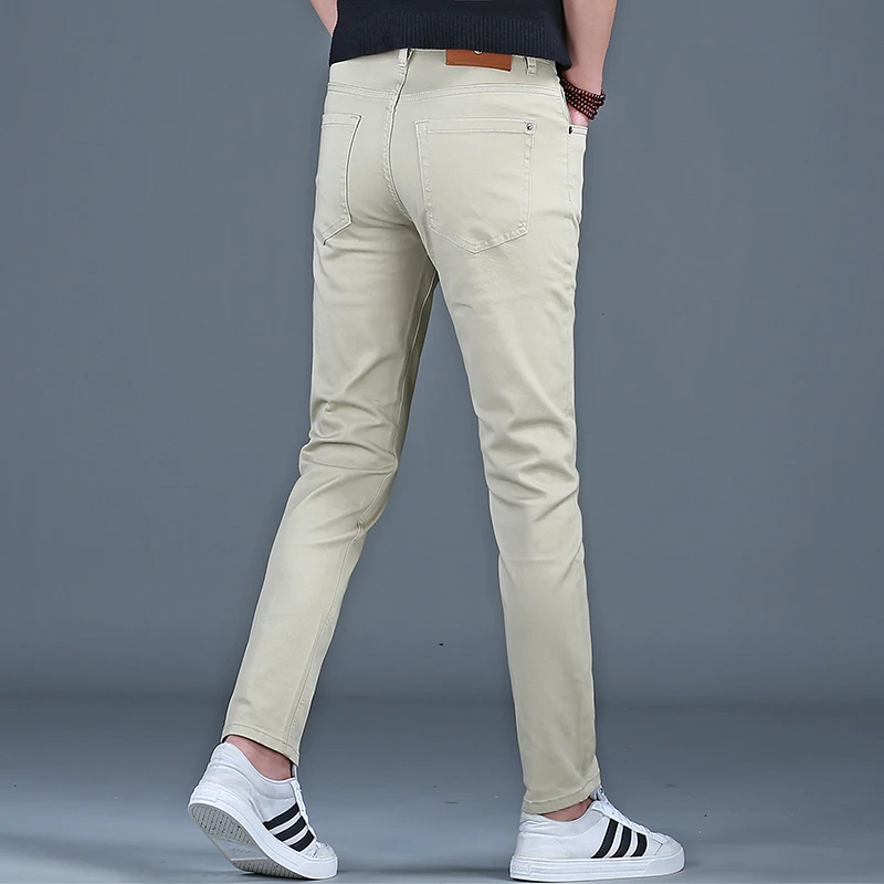 韩俊尼2025新款高端卡其牛仔裤潮牌美式显瘦百搭休闲修身小脚弹力