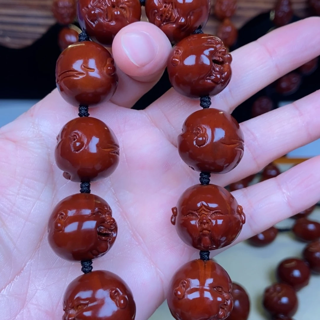 橄榄核吊坠人生百态