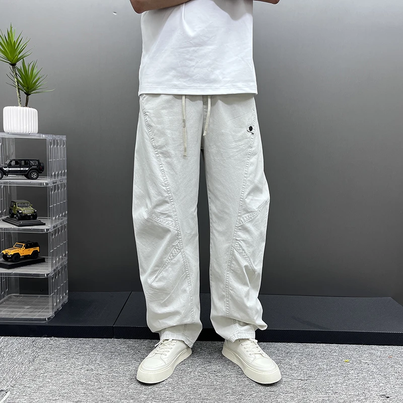 美式潮牌时尚纯色弯刀裤夏季薄款透气拼接工装裤慵懒风宽松直筒裤