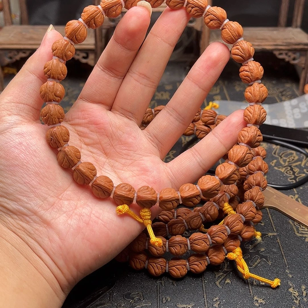 桃核吊坠玉龙手持