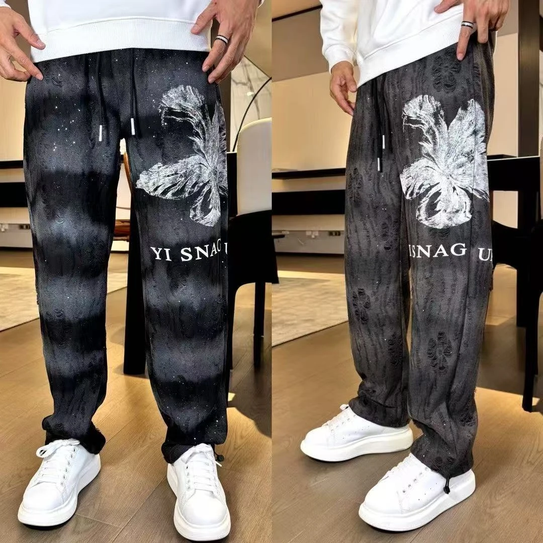 潮牌时尚秋冬休闲裤男满天星破洞印花帅气直筒裤宽松百搭运动长裤