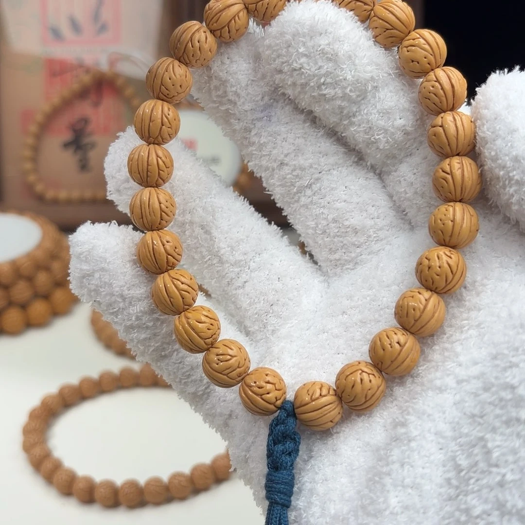 桃核手串1.1加「大肠纹脐中脐」野生桃核手持