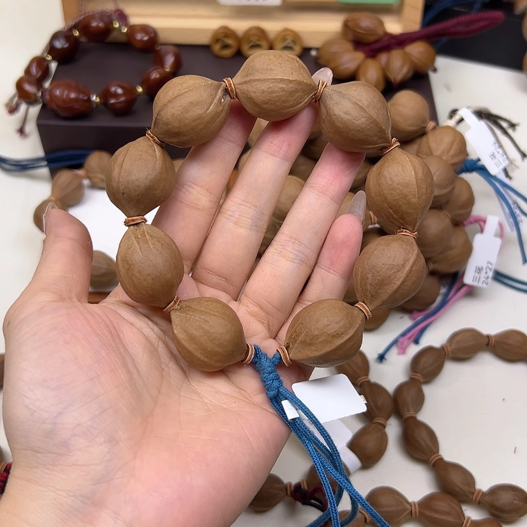 上***官橄榄核手串/手链三花21.28