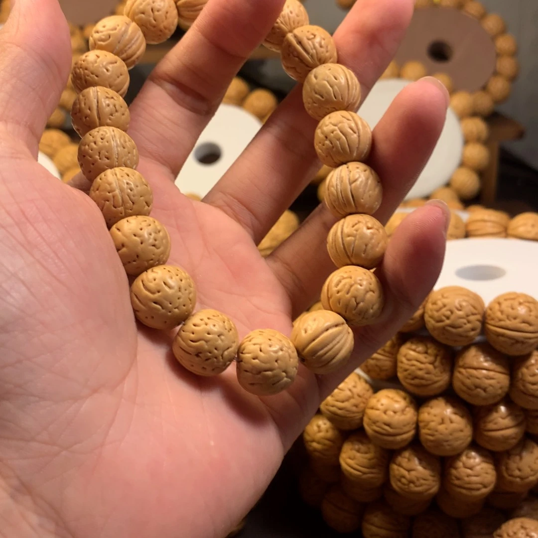 6*精品桃核金丹手串