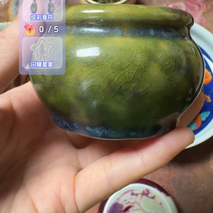 走***风熠羽毛球的钧瓷杯杯