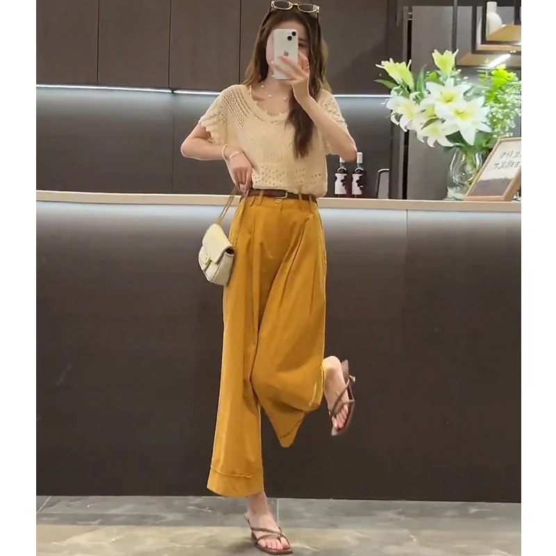 夏季穿搭一整套女2025新款时尚钩花镂空针织衫+九分阔腿裤两件套