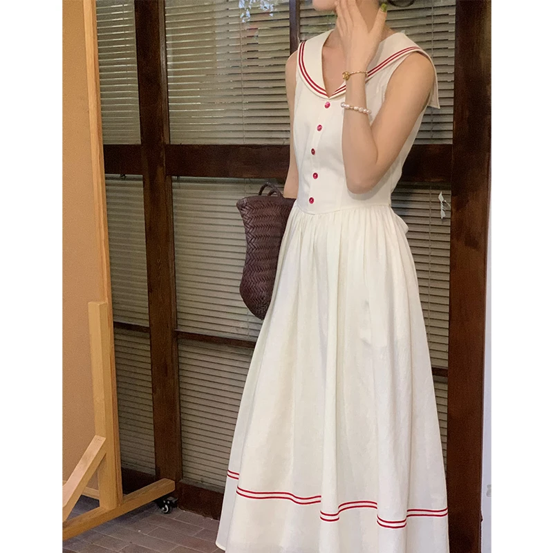 法式旅游度假风气质V领装饰连衣裙女夏季新款长裙67272