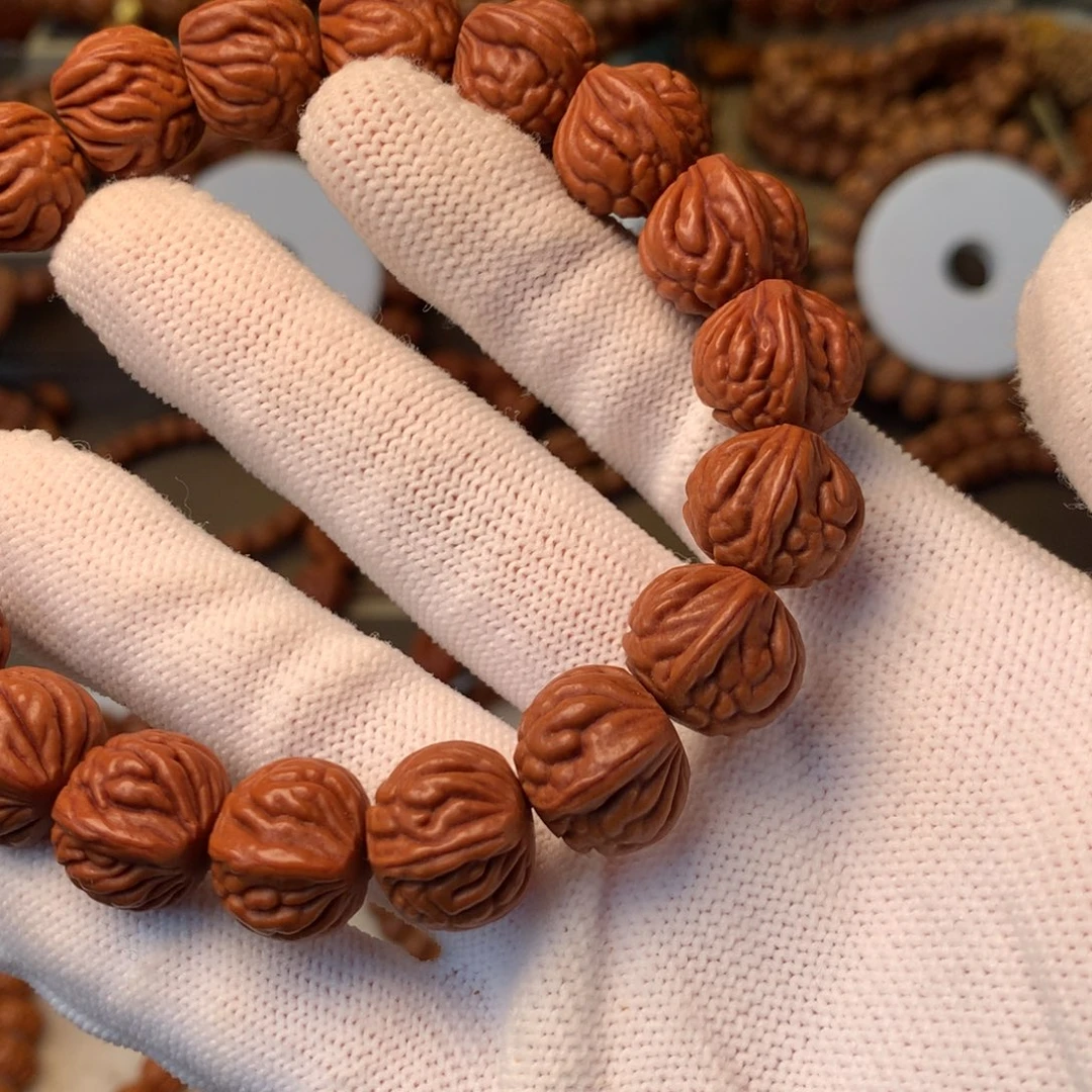 曾***提桃核手串秦岭龙纹