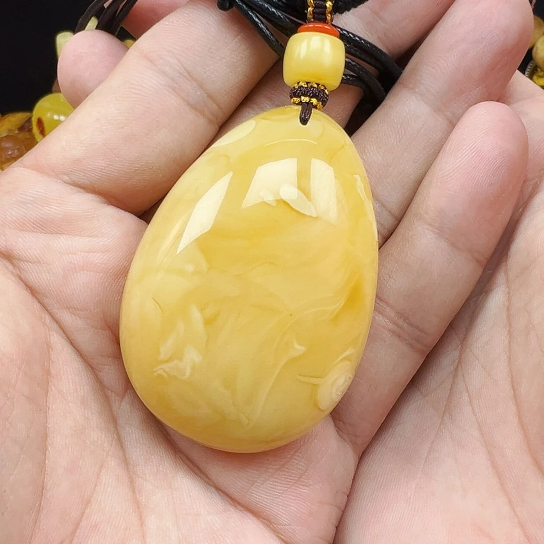 蜜蜡未镶嵌珠宝奇石开**?蜜蜡吊坠