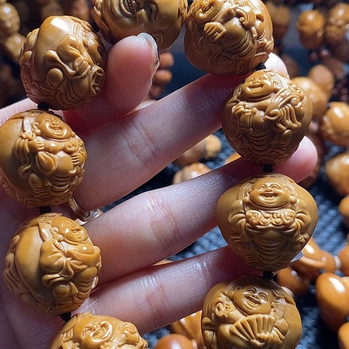 吊坠橄榄核张*浮雕财迷