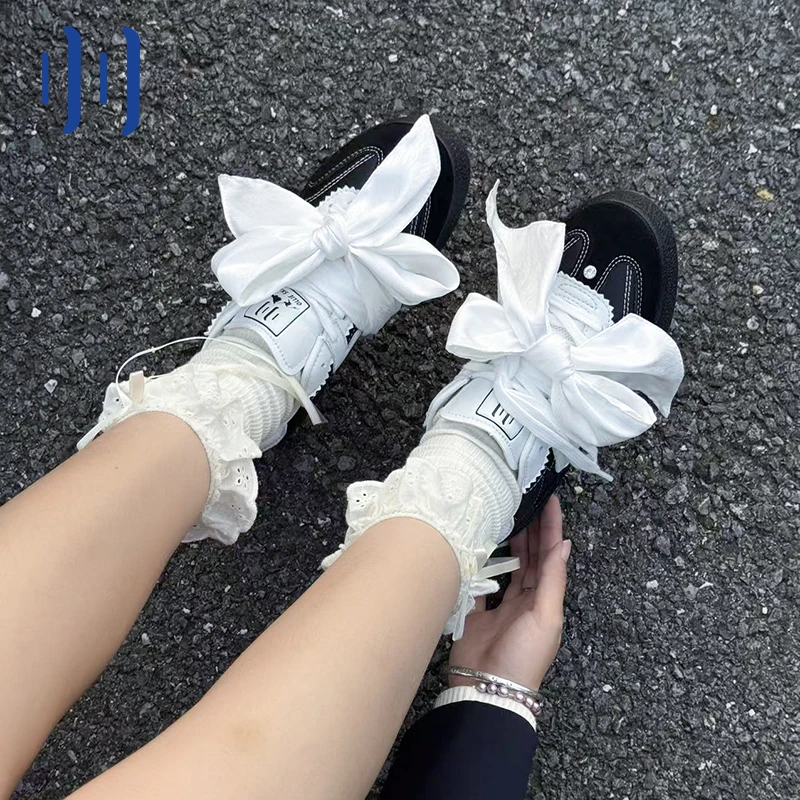 顽刻ollieskate黑色皮质蝴蝶结丝带生胶W系列国潮男女德训滑板鞋