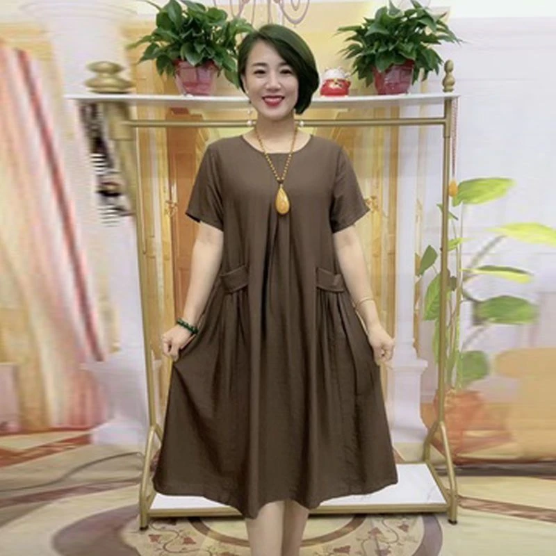 圆领纯色双兜中长款连衣裙夏季新款中老年女装韩版简约遮肉显瘦女
