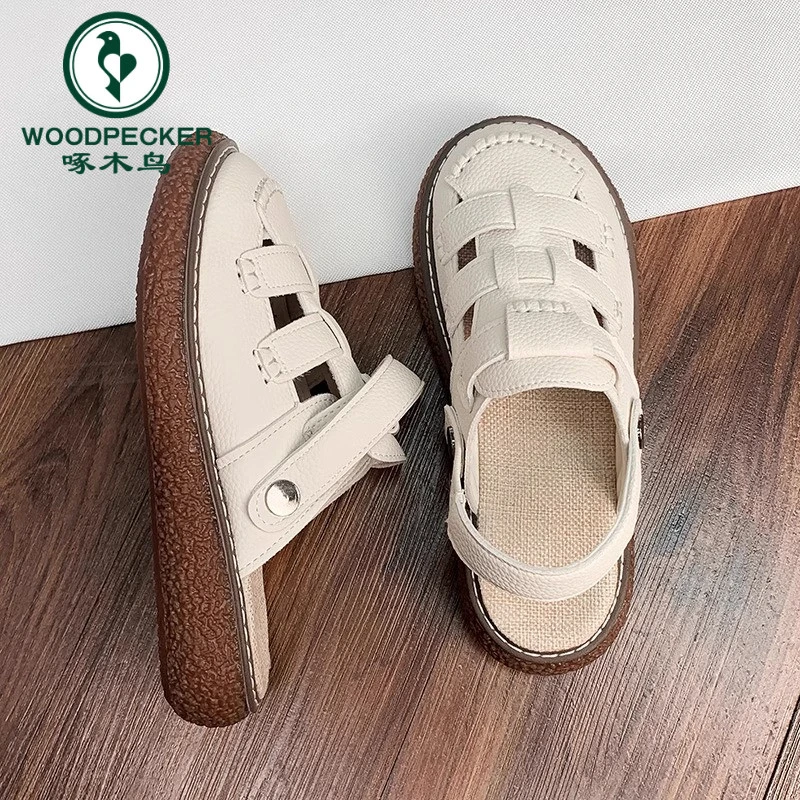 啄木鸟包头罗马凉鞋女2025年夏季新款厚底孕妇软底平底镂空沙滩鞋