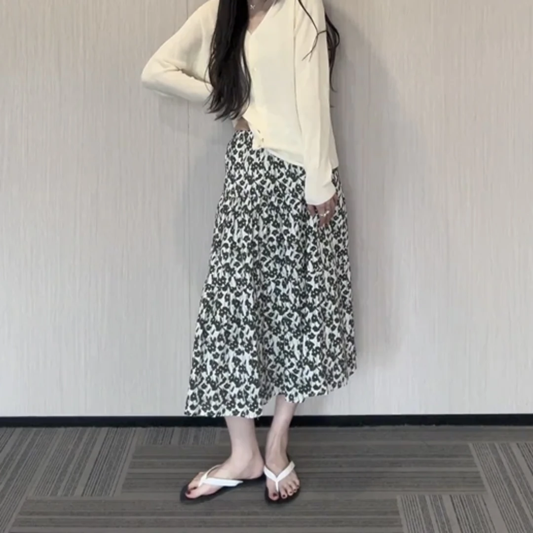 MM1181商场同款2025春夏新款时尚中长款半身裙黑色印花A字裙女