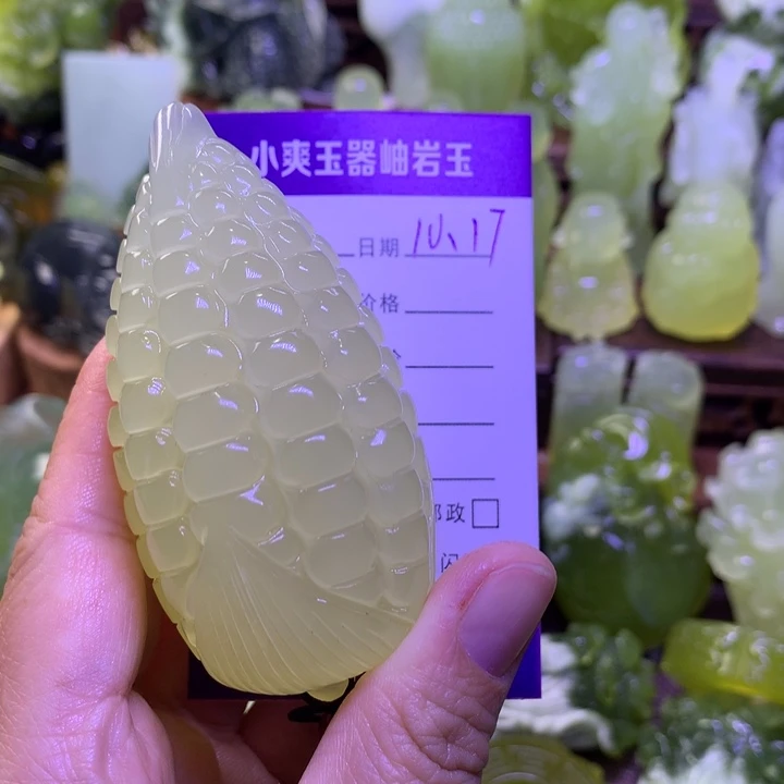 谈***生岫玉未镶嵌手把件