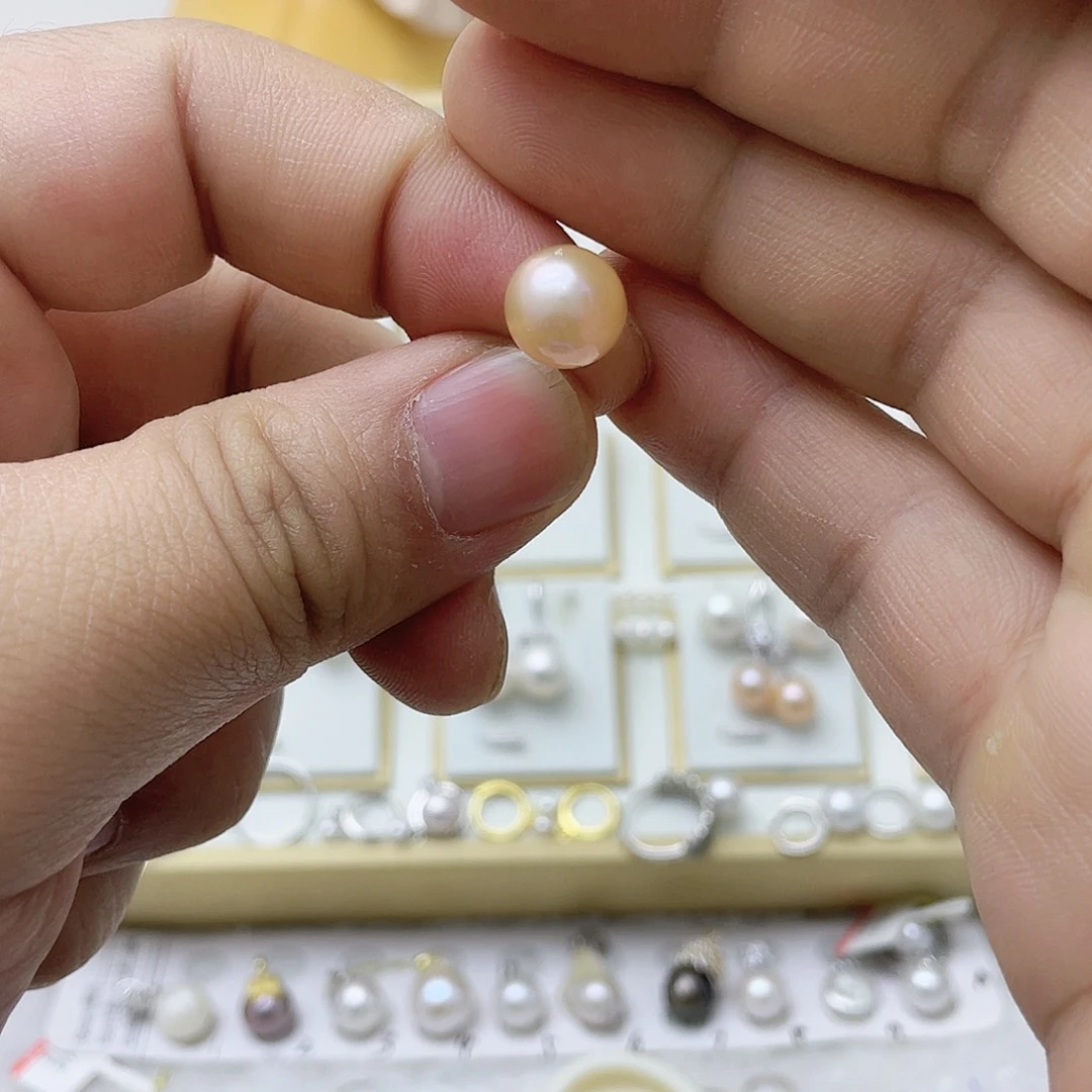 成***妮银S925镶嵌淡水珍珠耳饰