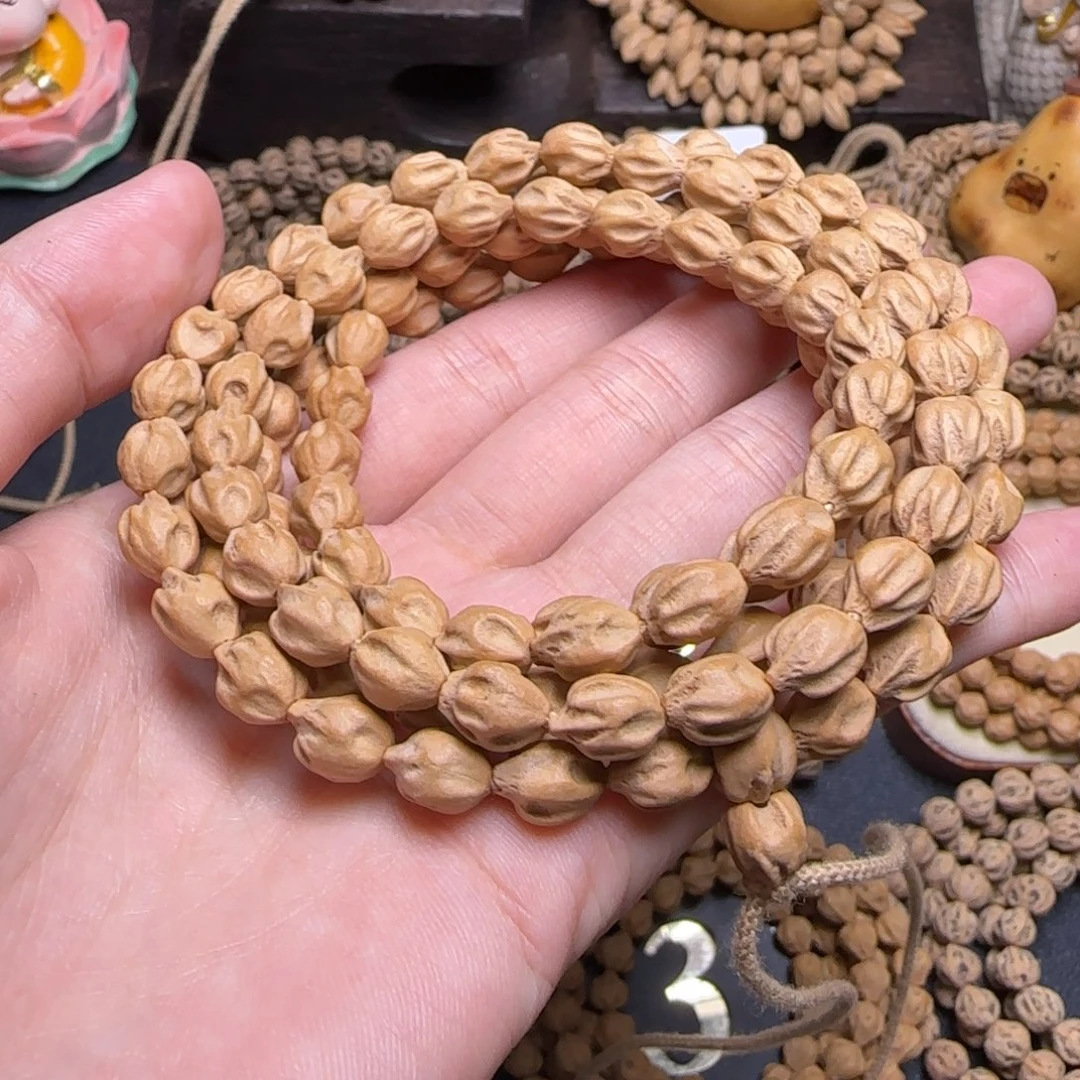 赵***～柏香籽/百香籽吊坠