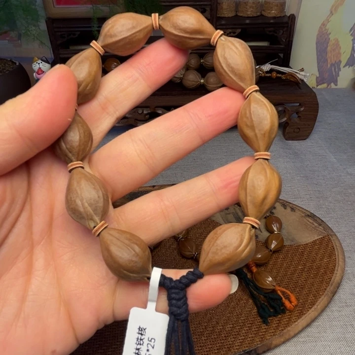 橄榄核手串/手链梅林铁核1.5*2.5三面佛