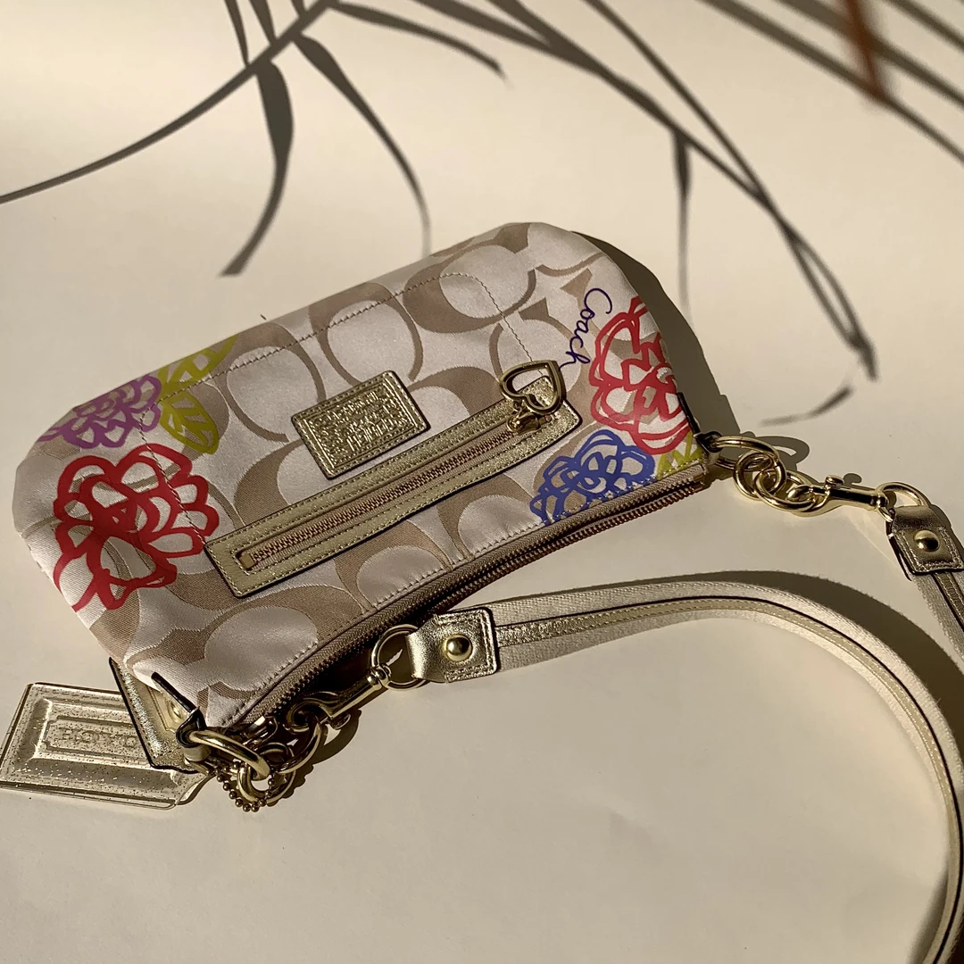 95新 COACH/蔻驰 经典百搭简约时尚复古花卉系列开口笑单肩斜挎包