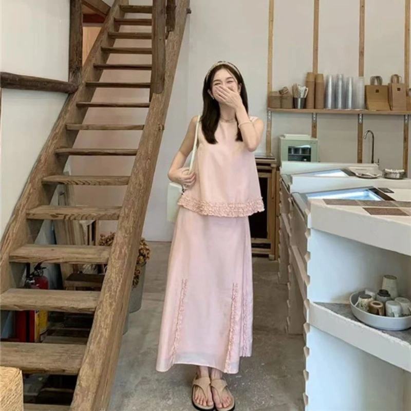 复古时尚套装2025夏季新款减龄少女粉宽松遮肉显瘦吊带半裙两件套