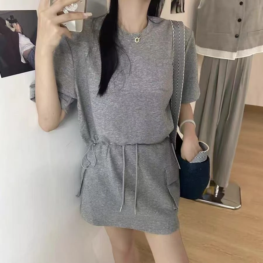 604/25530/143-8  抽绳垫肩短袖T恤+松紧腰包臀短裙套装