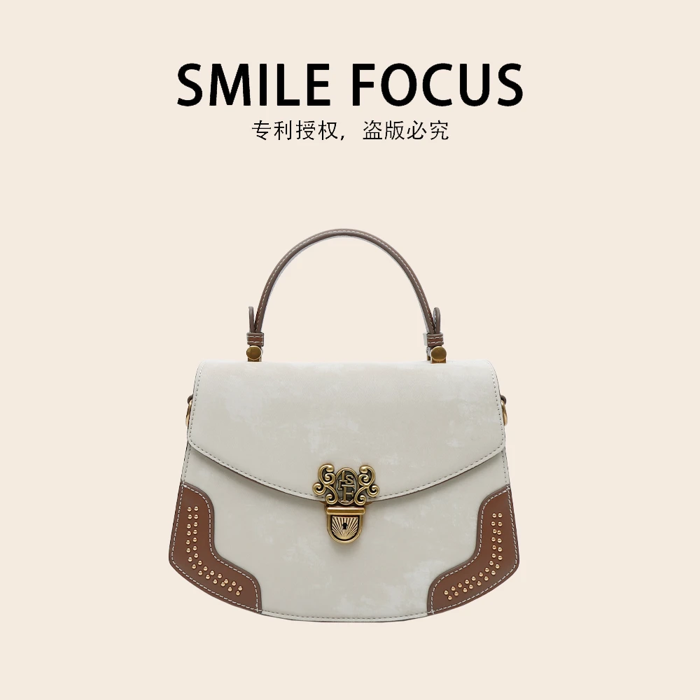 SMILE FOCUS微笑有约2025潮款新品轻奢高级感女士手提包