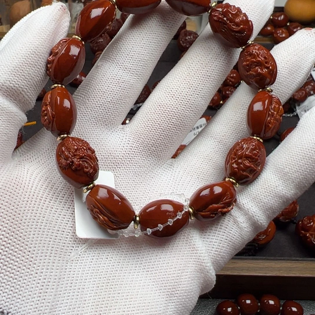 吊坠橄榄核こ****℡橄榄核