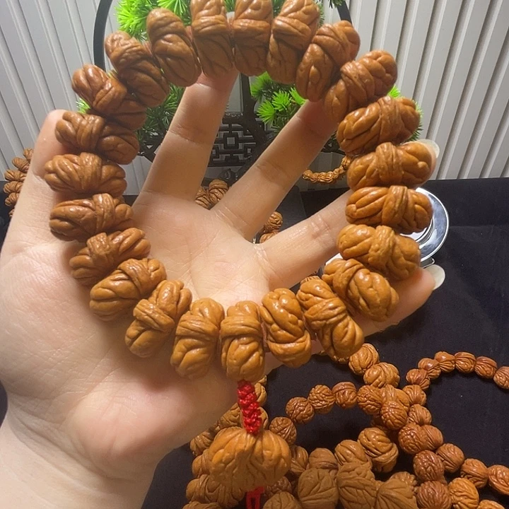 木质类秦岭龙纹桃核手持