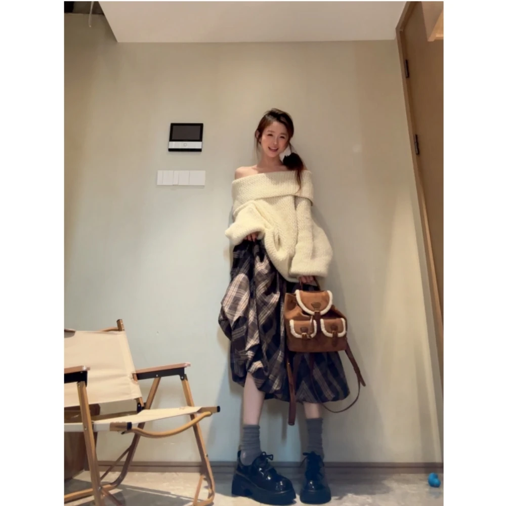 显瘦纯棉感亲肤柔软双色格纹松紧立体花苞下摆长裙半身裙