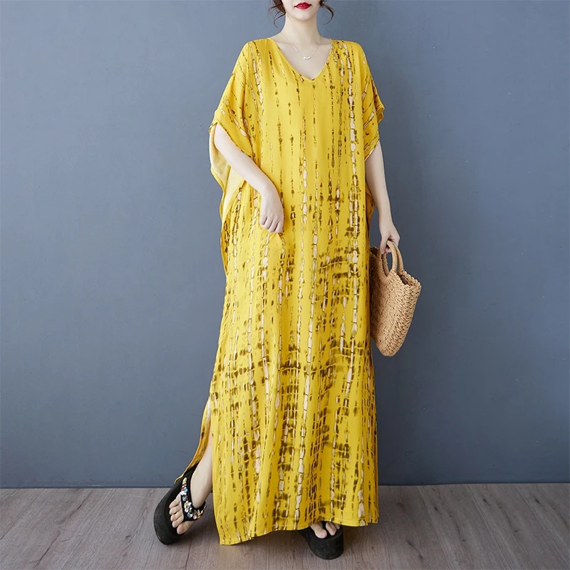 清仓~大码宽松中老年妈妈装气质减龄度假风沙滩裙显瘦短袖连衣裙