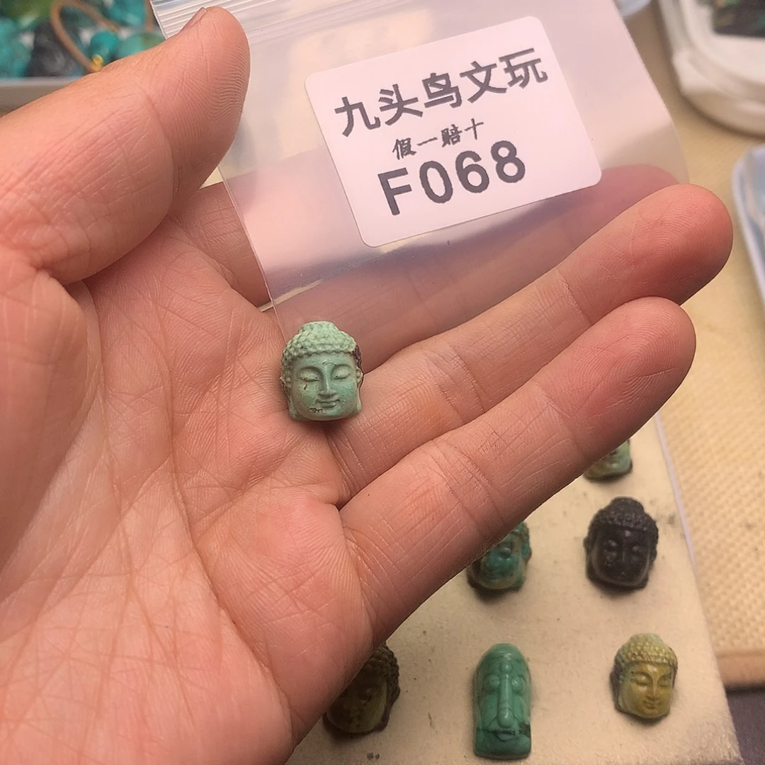 用***2天然辰砂佛头配饰产品