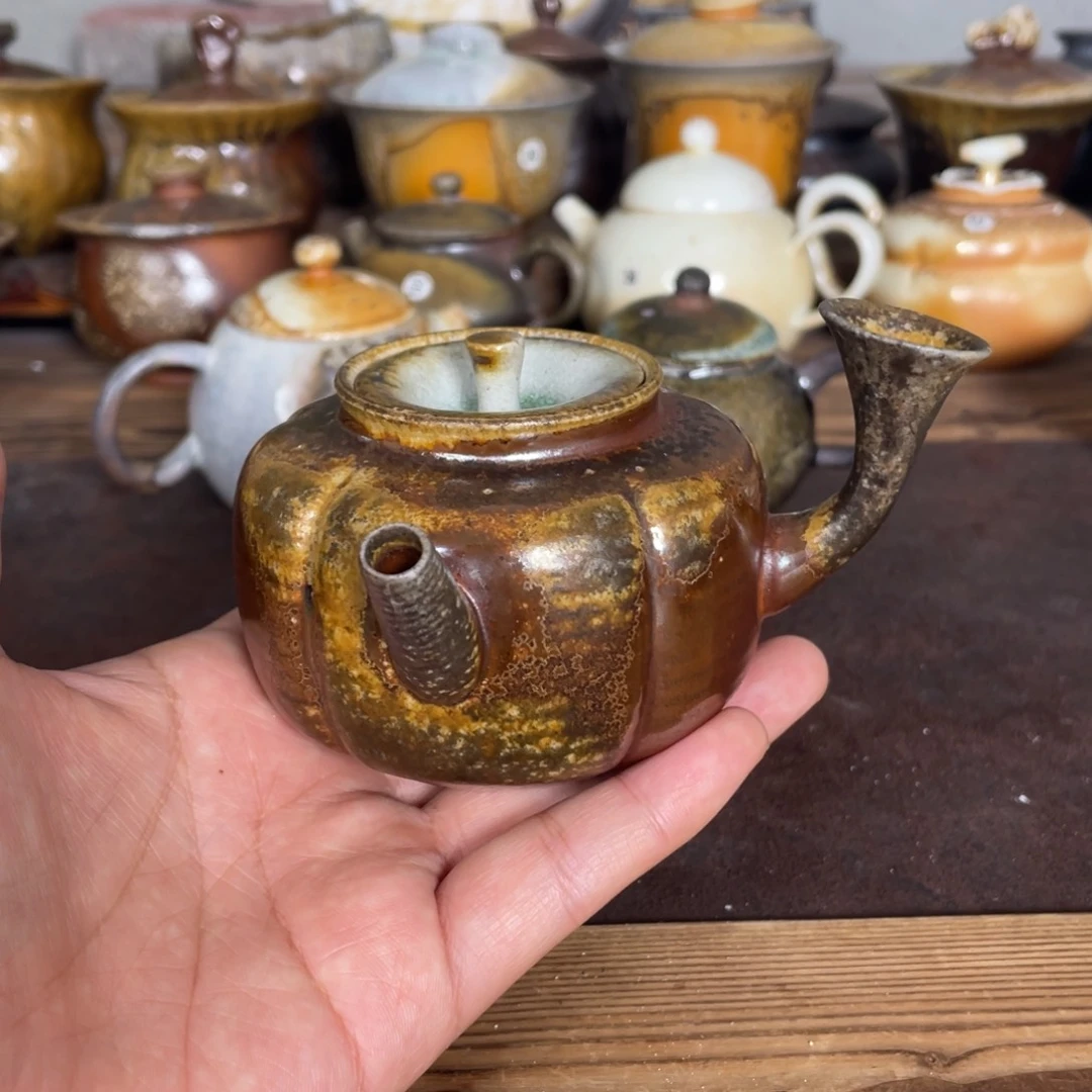 侧把壶陶泥。 容量150