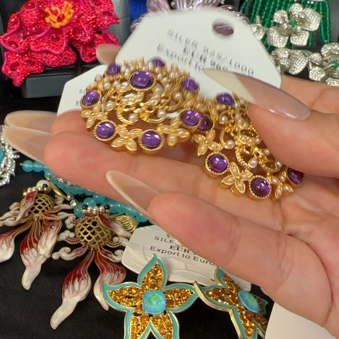 巧***子羽毛纯铜耳饰品的时候