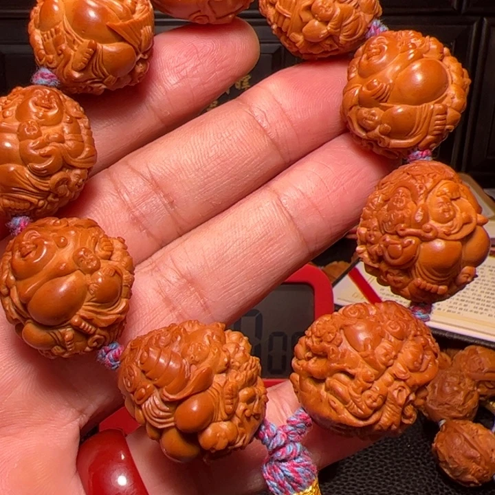 哈***哈手串橄榄核百子弥勒