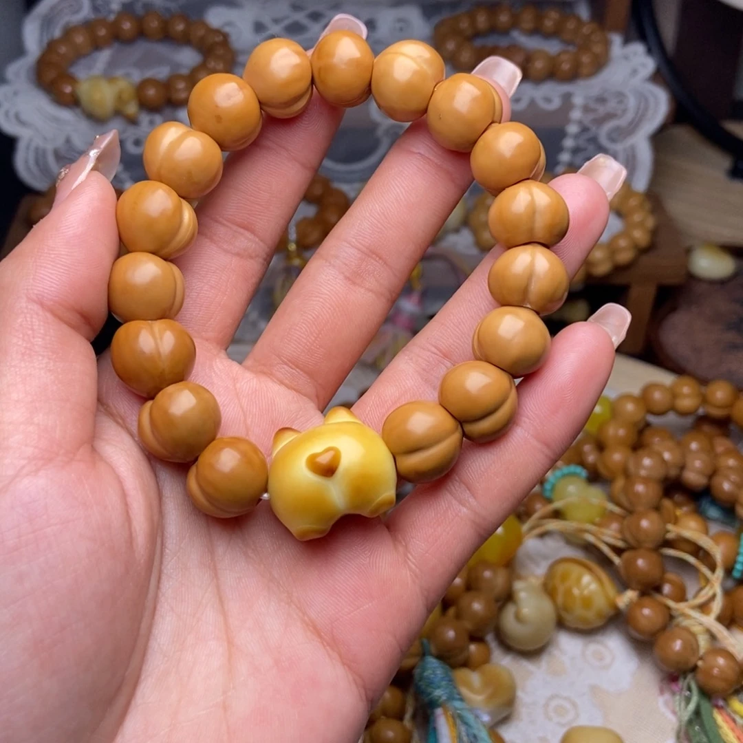 木质类屁桃手串13光面