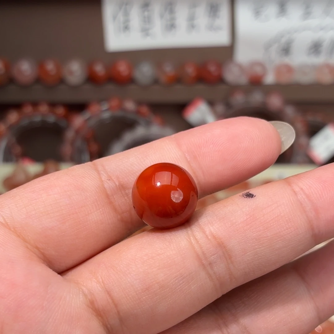 彡****南红玛瑙未镶嵌川料13咪单珠
