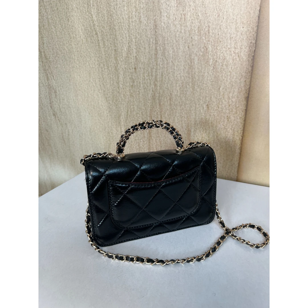 TOLEX2025新款手工时尚缠绕百搭手提女包黑色