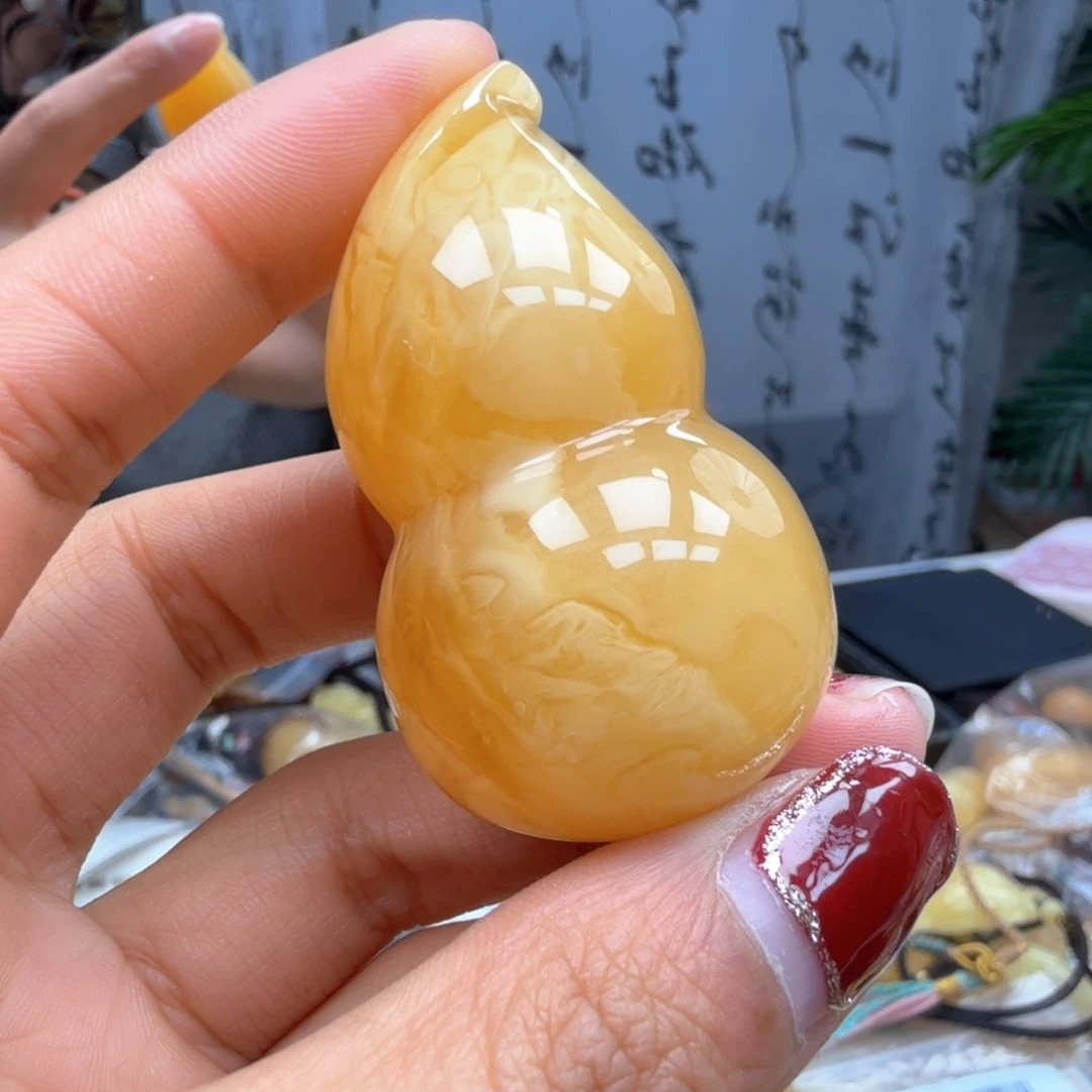 琥珀裸石未镶嵌龙*花……