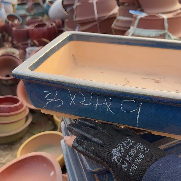 紫砂和花木两件的制作是我公司