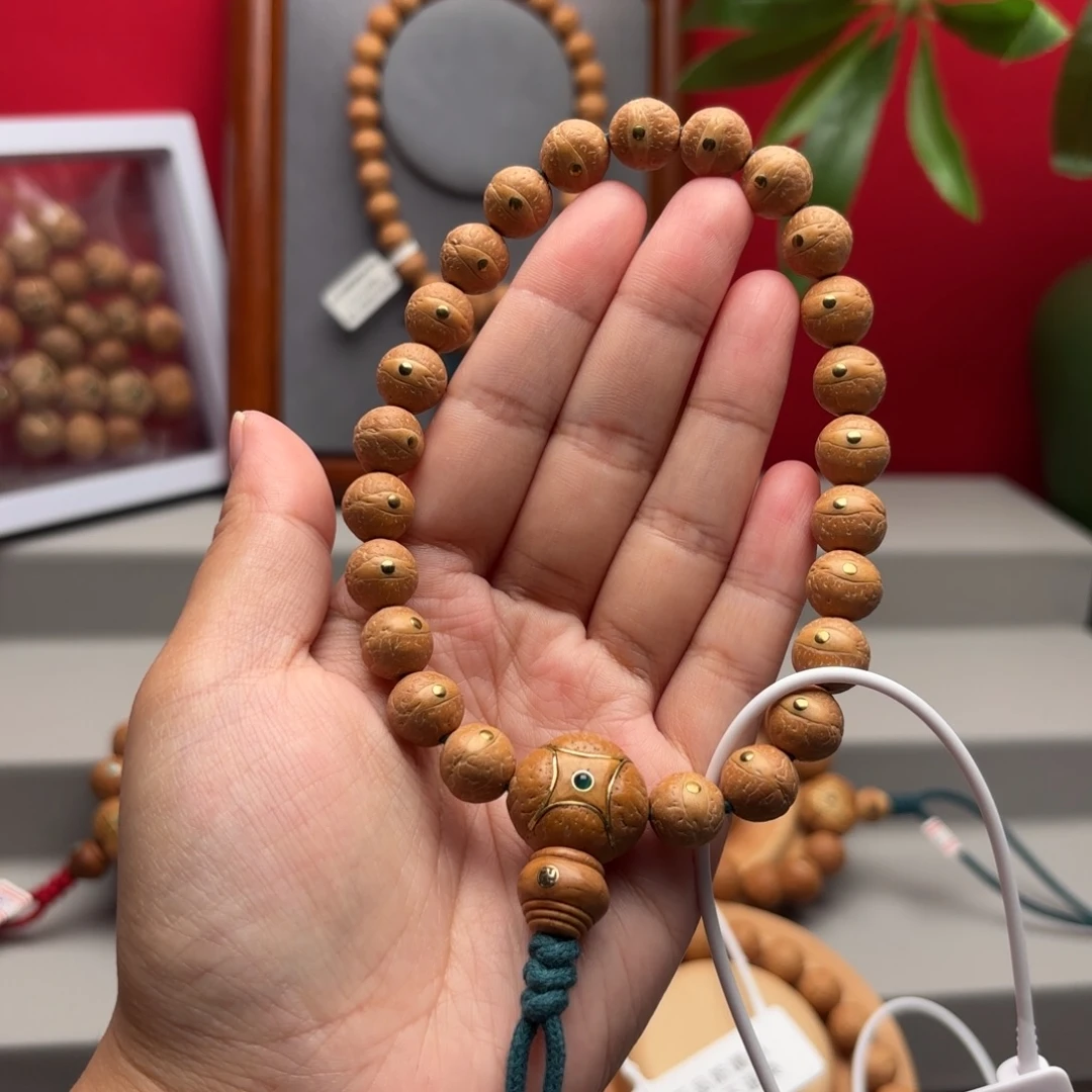 手串凤眼菩提10.7左右铜钉手串