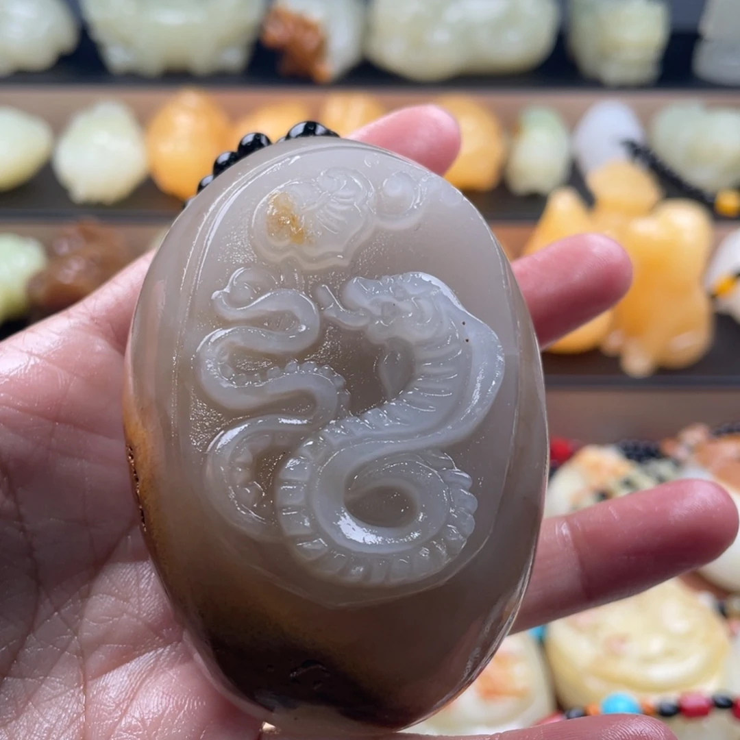 林***y石材古青石手把件