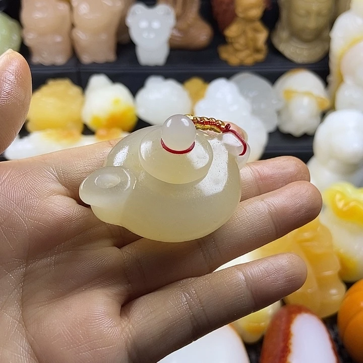 无花朵原石手把件