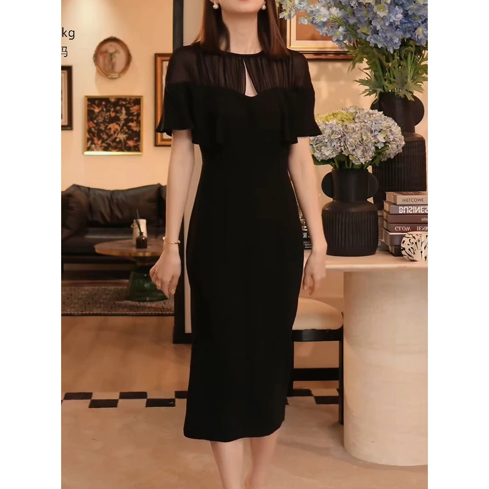 法式轻奢气质名媛拼接镂空连衣裙2025夏季新款圆领通勤小黑裙