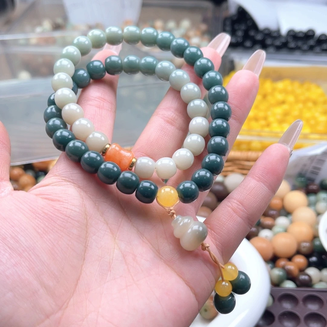 白玉菩提吊坠z9mm150颗。实玉料小酒桶