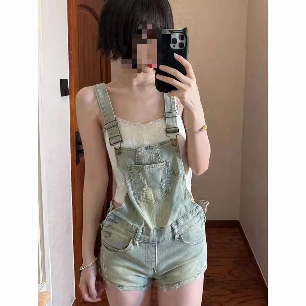 做旧水洗破洞牛仔背带超短裤女美式辣妹复古修身包臀吊带短裤热裤