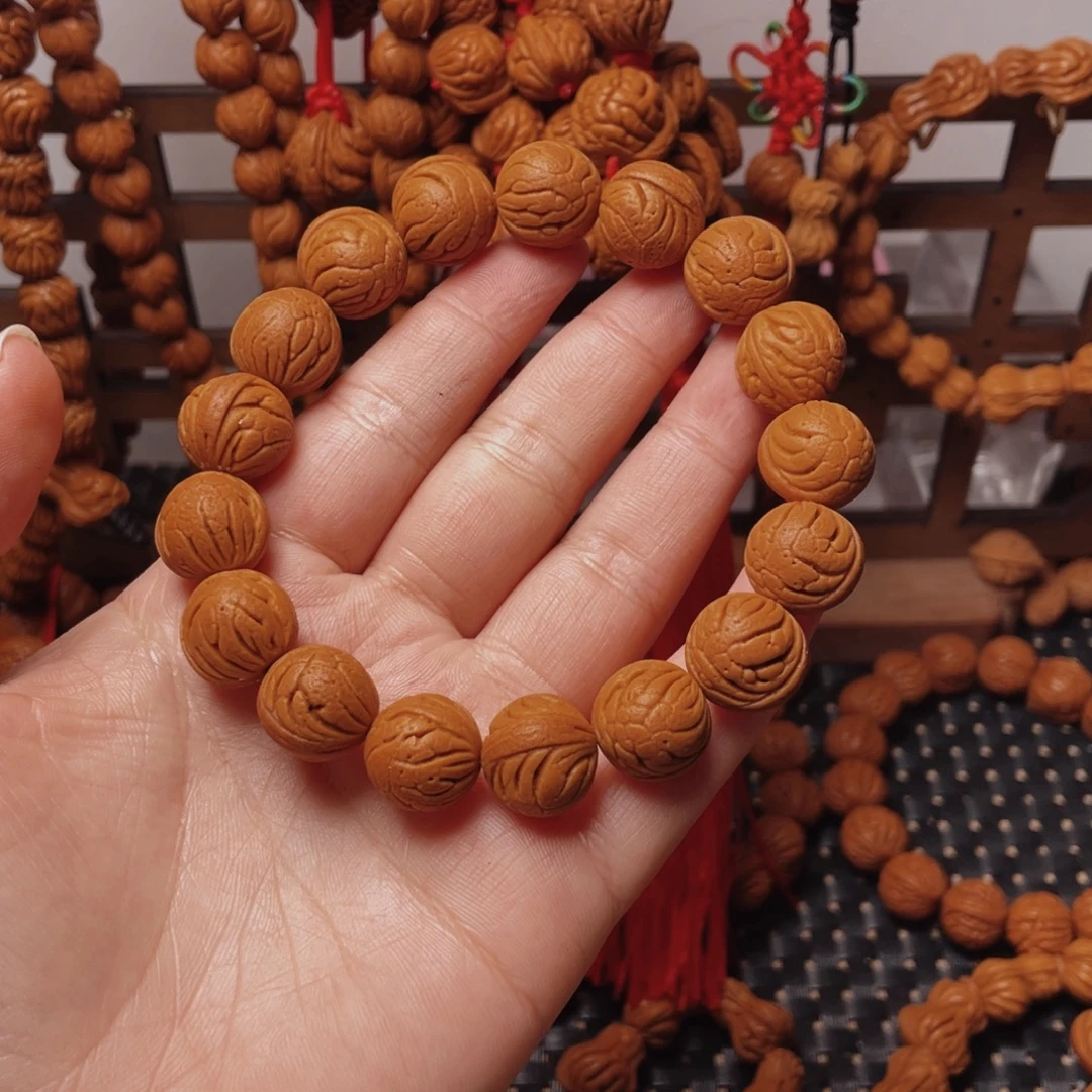 木质类龙纹桃枭手串