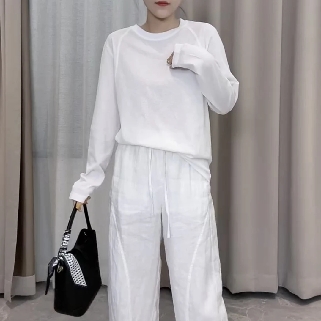 轻熟风纯色长袖常规款抗皱T恤打底衫舒适运动气质