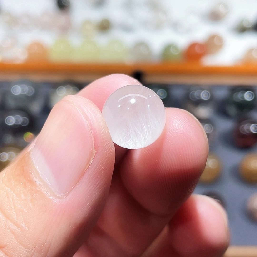 陈***情未镶嵌珠宝半成品水晶11mm兔毛发晶单珠打孔不退不换